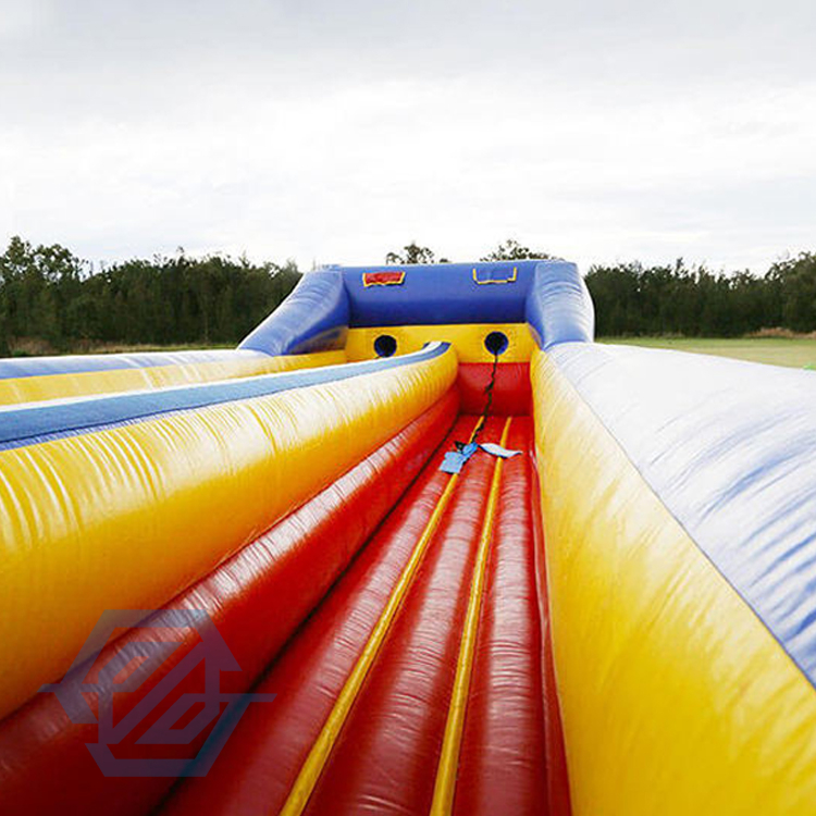 Jogo inflável do esporte do desafio da corrida do tirante com mola inflável da pista do twister 2